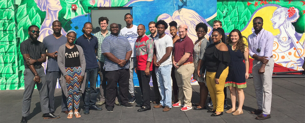 The entire class of 2017 Heinz Fellows, standing outside of the Jeron X. Grayson Center in Pittsburgh's Hill District.