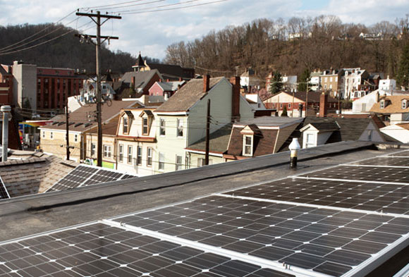 View from the roof of the Millvale Community Library, where they have installed enough solar panels to provide more energy than they can use. Houses and building of the boro are visible in the background.