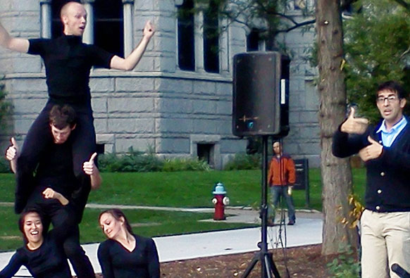 Actors from Attack Theatre perform "Some Assembly Required," while American Sign Language interpreter participated in the session.