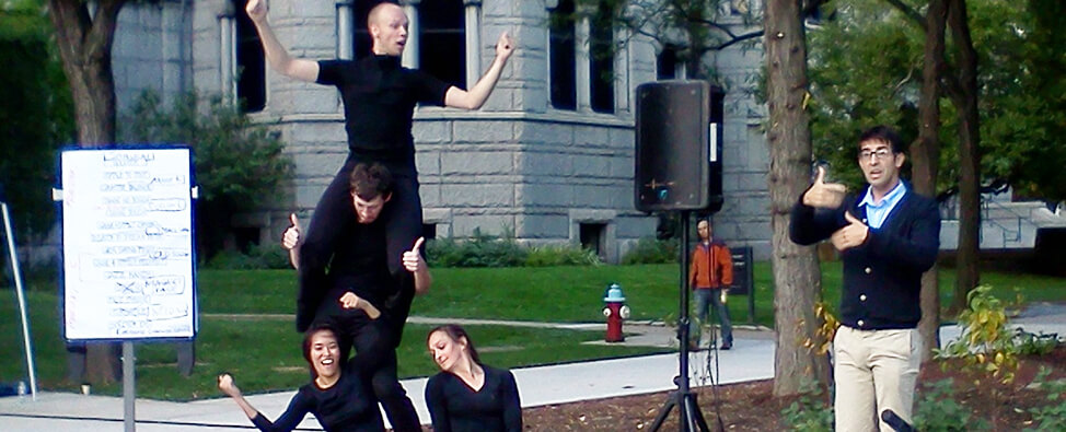 Actors from Attack Theatre perform "Some Assembly Required," while American Sign Language interpreter participated in the session.