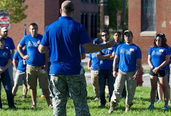 Veterans from The Mission Continues getting their orders in the morning at the National Day of Service in Homewood.